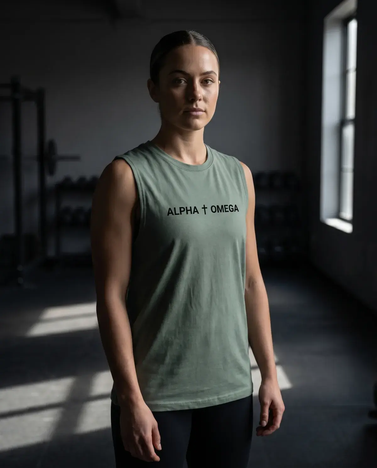 Portrait of an athlete in the sage Alpha Omega piece